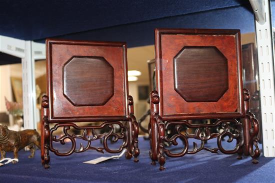 A pair of Chinese carved and pierced hardwood table screens, 19th century, overall height 20.3cm